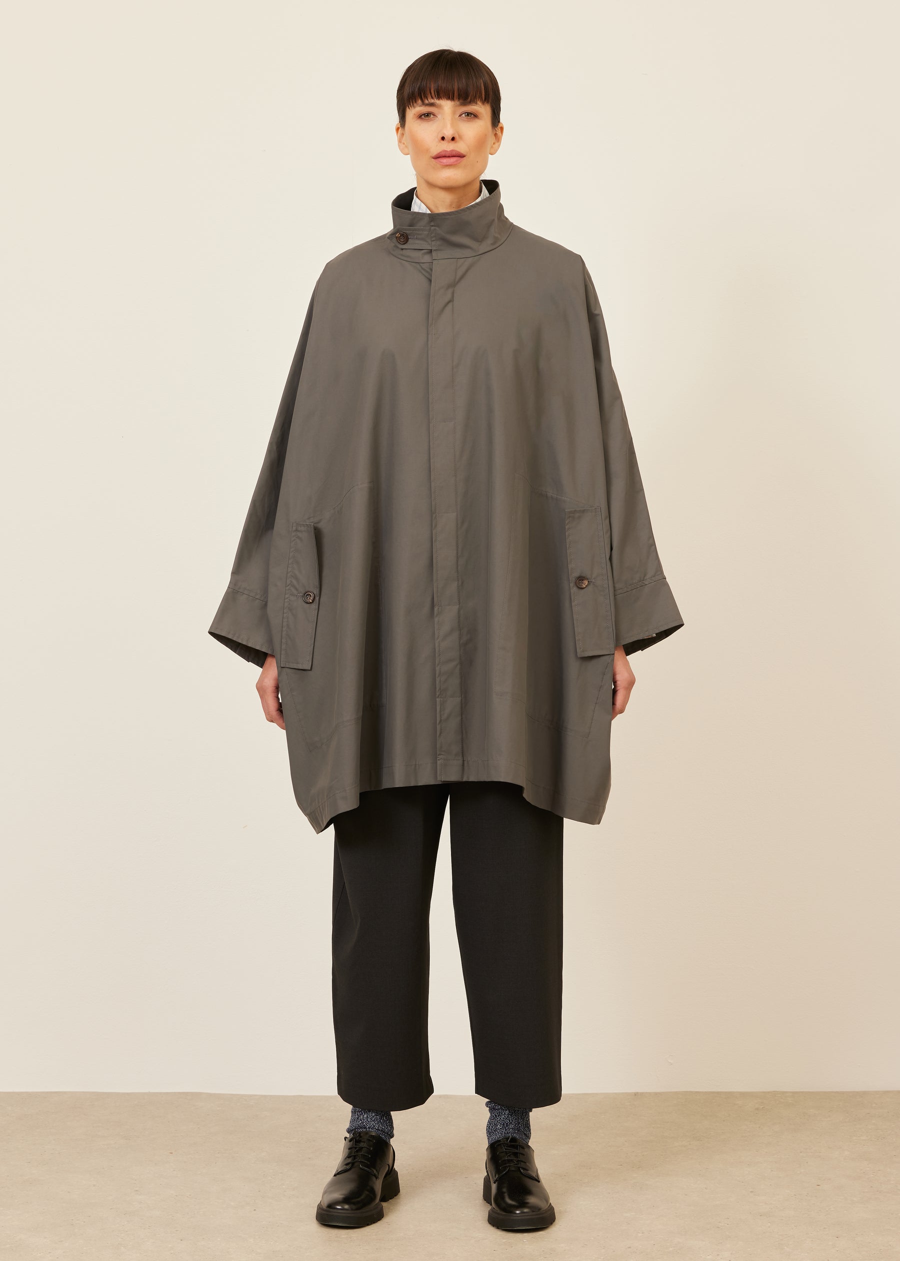 extra wide sloped shoulder raincoat with tabs - very long