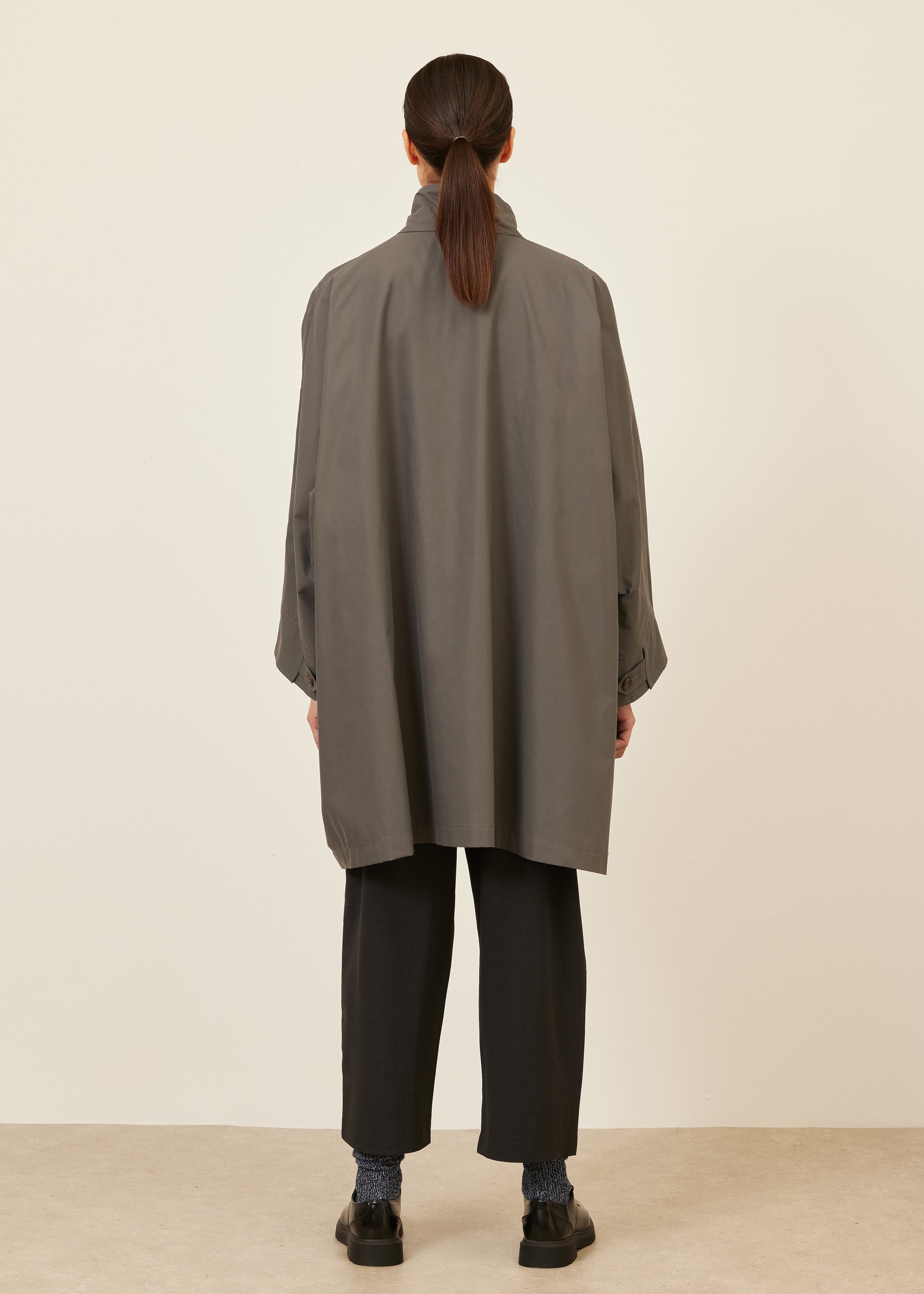 extra wide sloped shoulder raincoat with tabs - very long